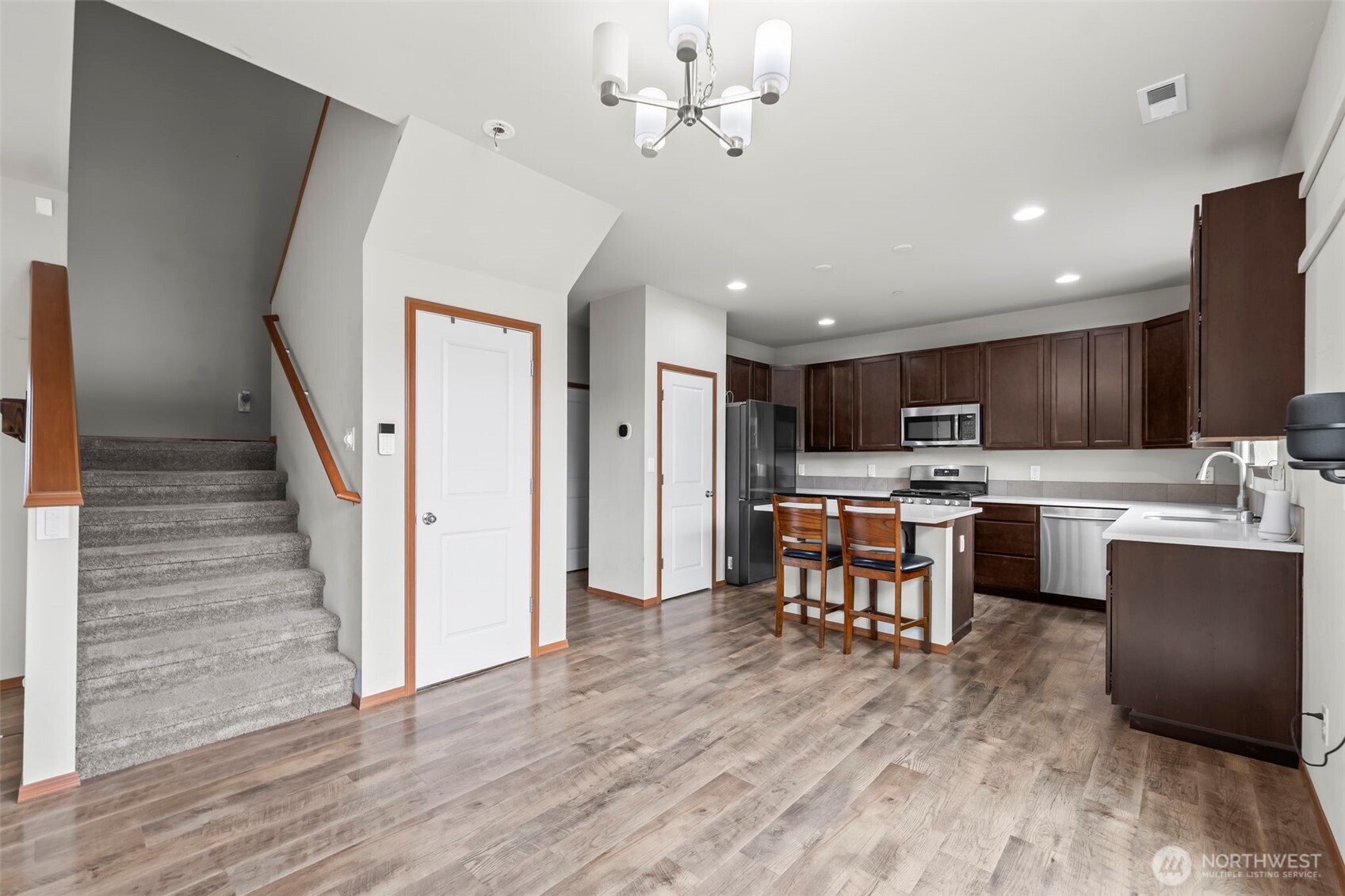 2540 Filbert Avenue Bremerton, WA 98310 - Photo 9 of 28 a view of kitchen with cabinets and wooden floor