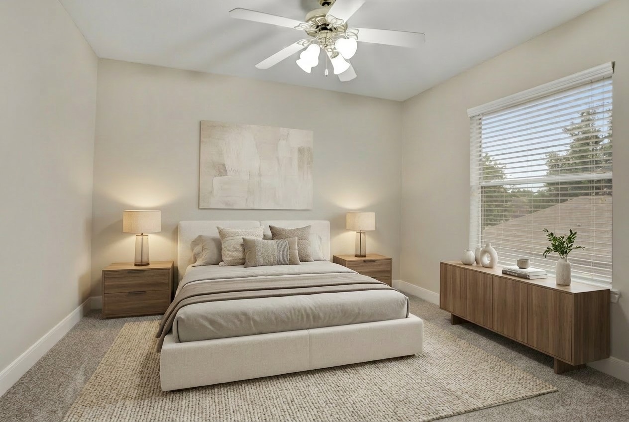 24418 Falcon Point Drive Katy, TX 77494 - Photo 27 of 40 a bedroom with a large bed and a chandelier