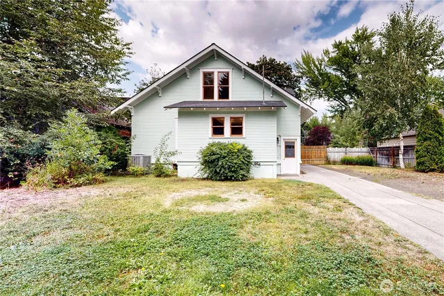 a view of empty room with wooden ceiling
