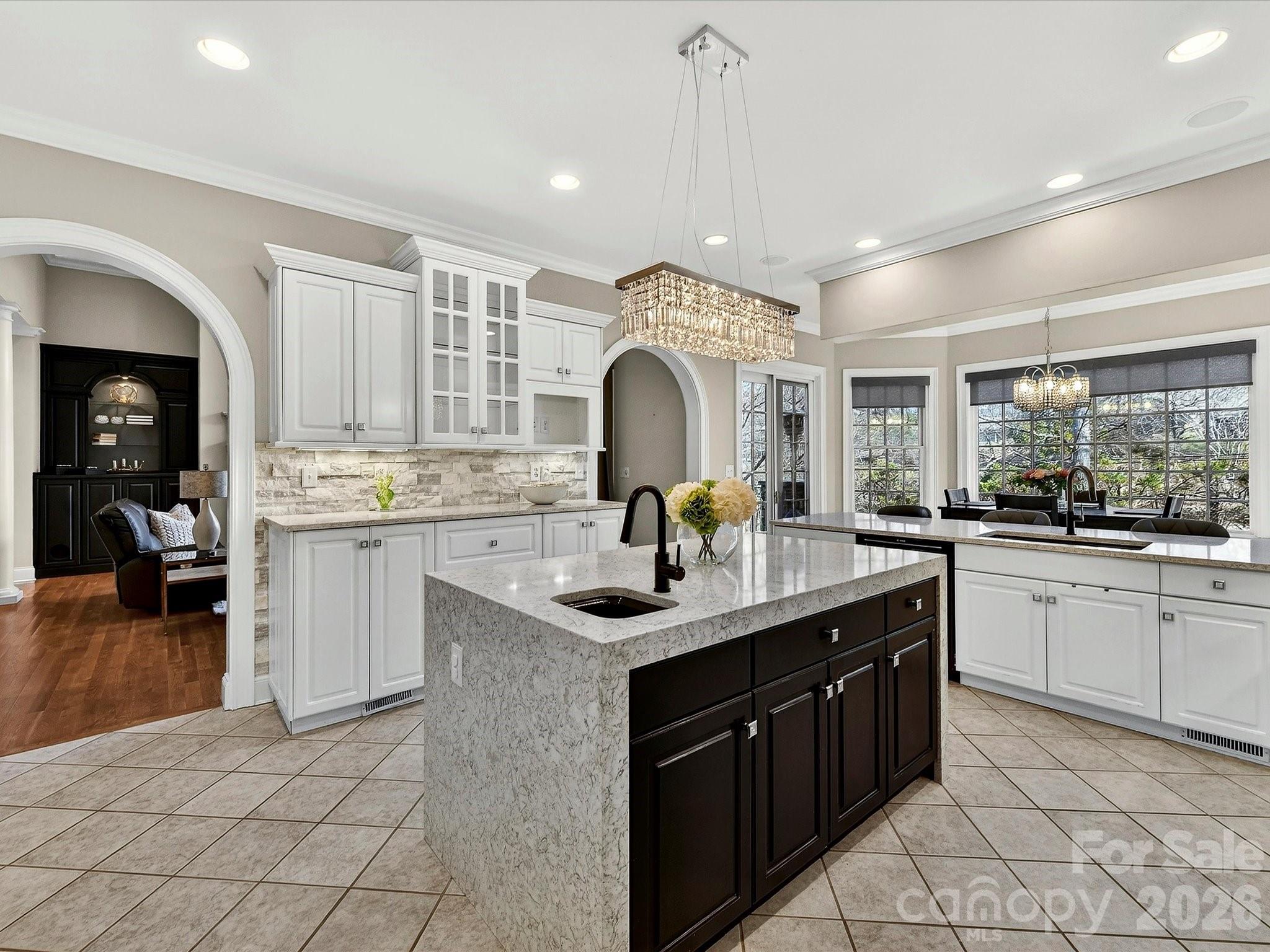 1779 8th St Drive Northwest Hickory, NC 28601 - Photo 11 of 36 a kitchen with a sink stove and cabinets