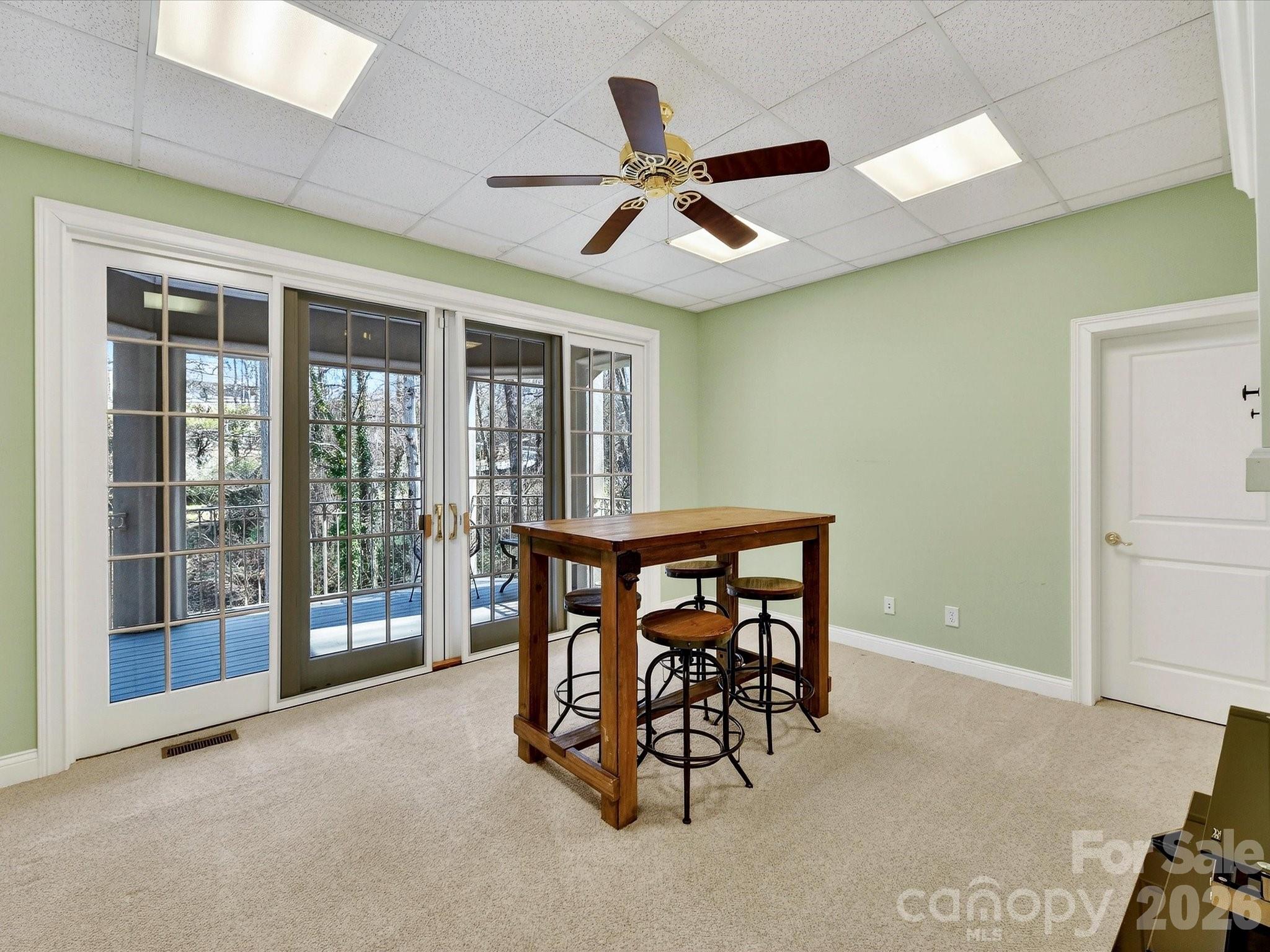 1779 8th St Drive Northwest Hickory, NC 28601 - Photo 29 of 36 a view of a livingroom with furniture and a ceiling fan
