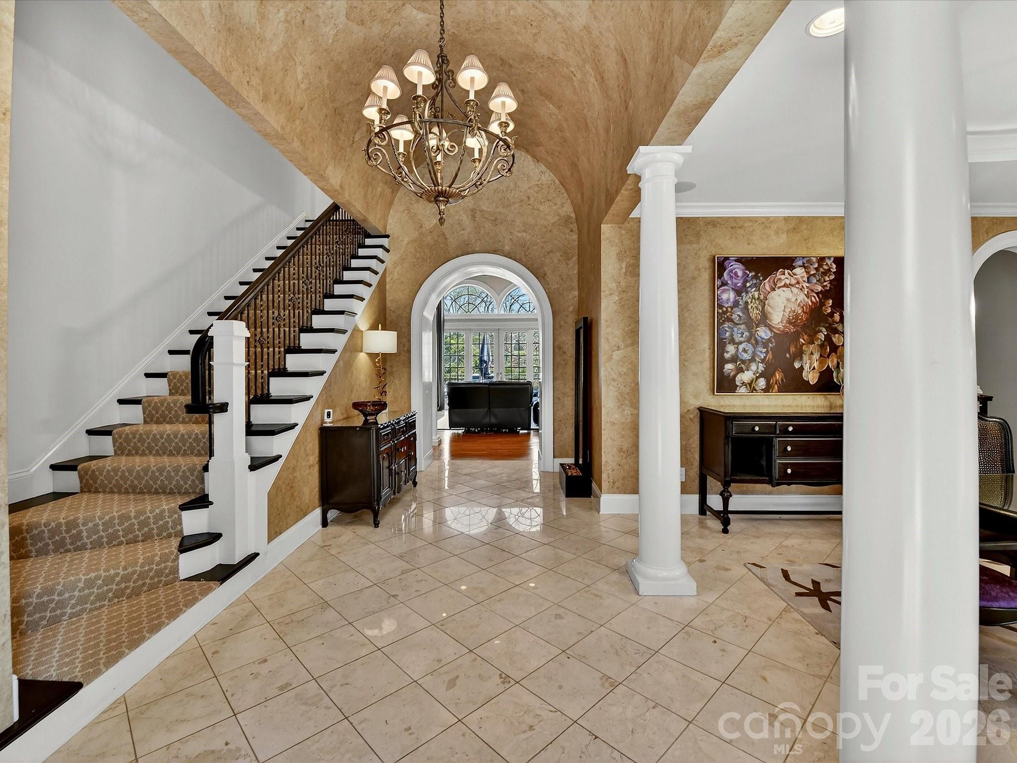 1779 8th St Drive Northwest Hickory, NC 28601 - Photo 3 of 36 a view of a hallway with entryway and chandelier