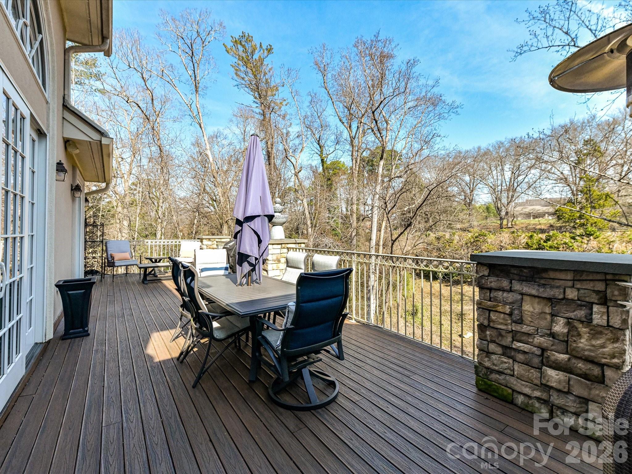 1779 8th St Drive Northwest Hickory, NC 28601 - Photo 31 of 36 a view of a chairs and table on the wooden deck