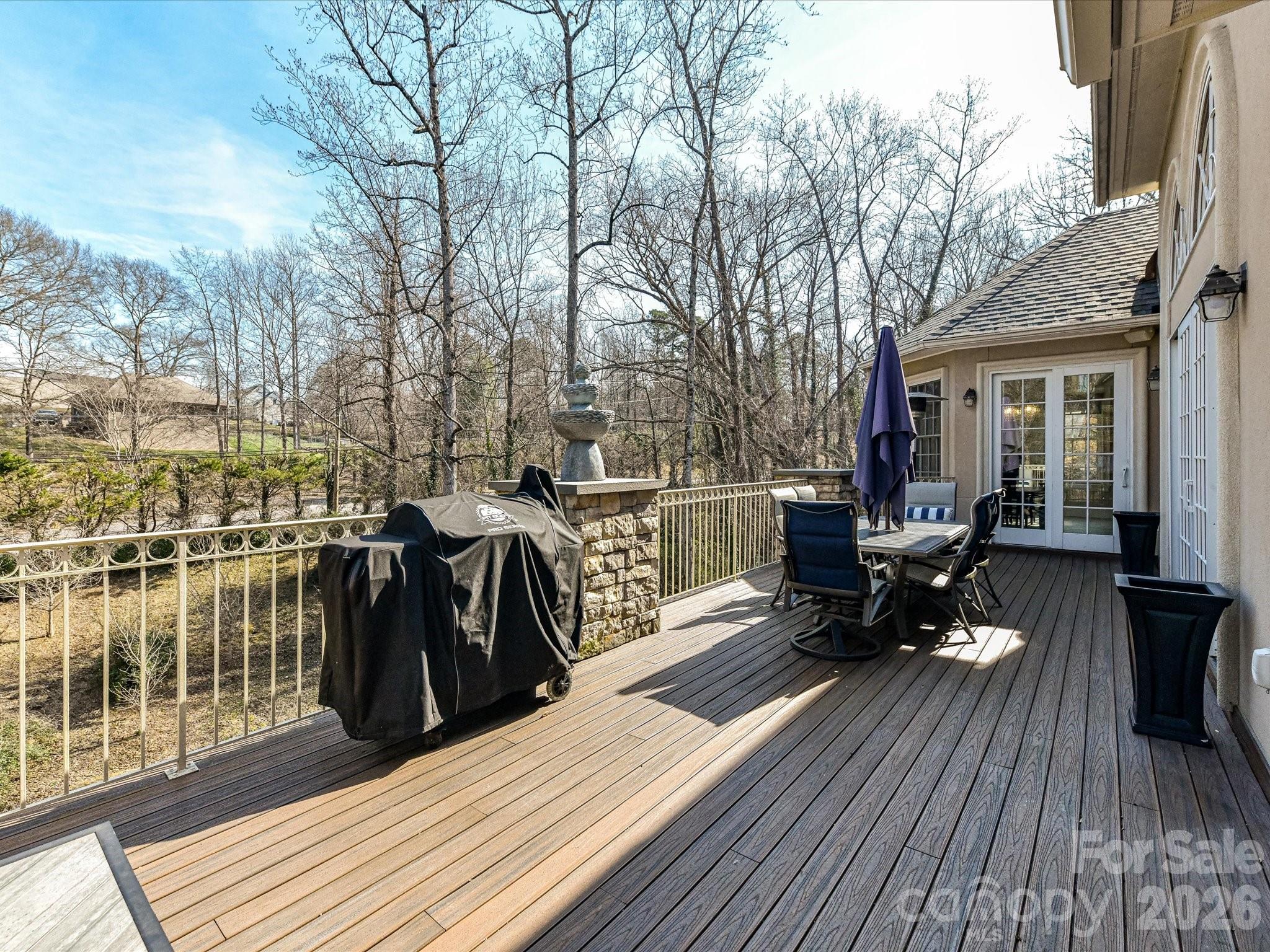 1779 8th St Drive Northwest Hickory, NC 28601 - Photo 32 of 36 a view of a balcony with chairs and wooden floor
