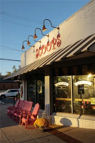 a view of a retail shop on the street