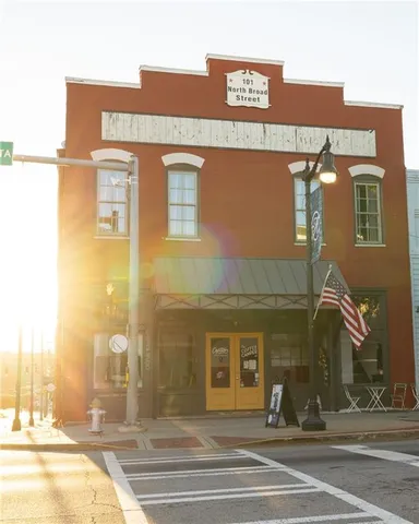 a view of a building with a street