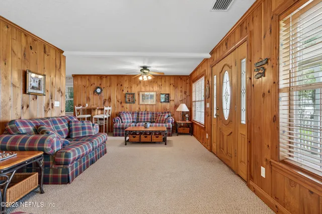 a view of front door with livingroom