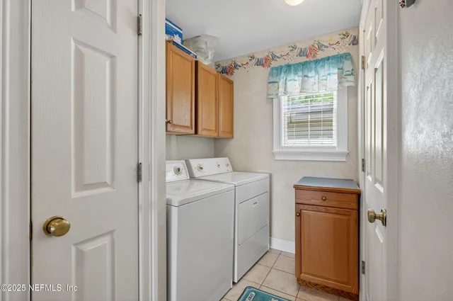 a bathroom with a sink and a window