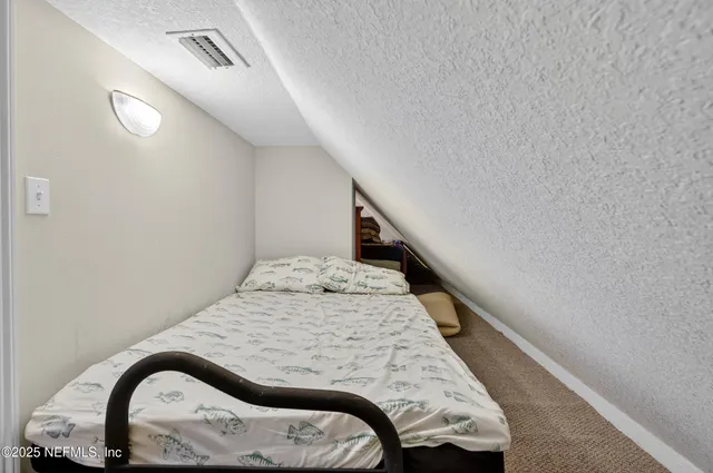 a bathroom with a sink toilet and mirror