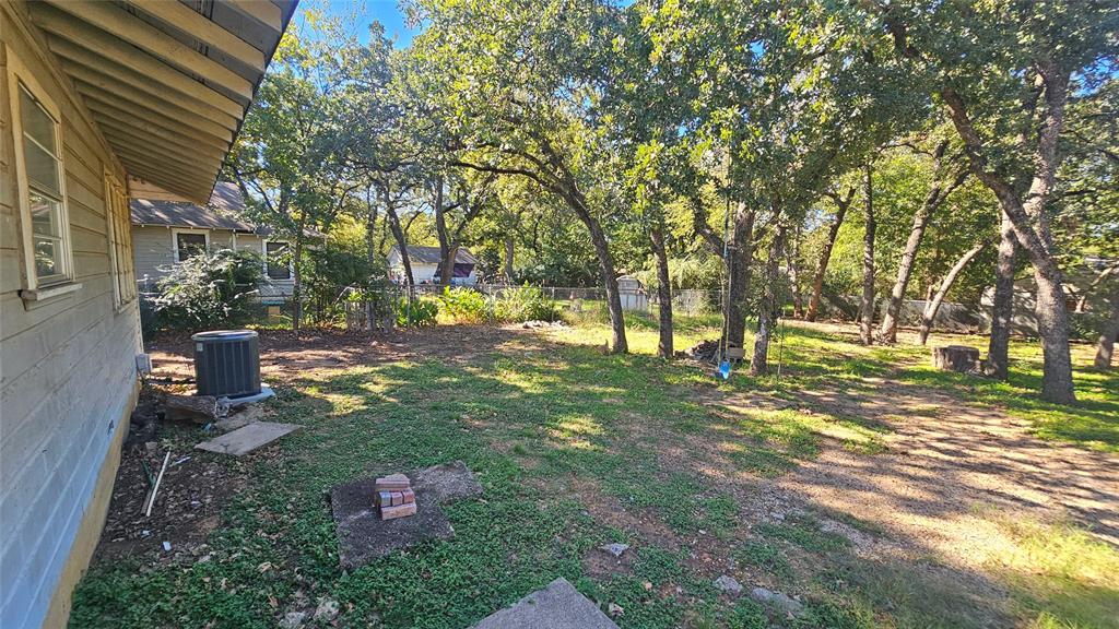 2621 North Locust Street Denton, TX 76209 - Photo 23 of 26 a view of yard with tree