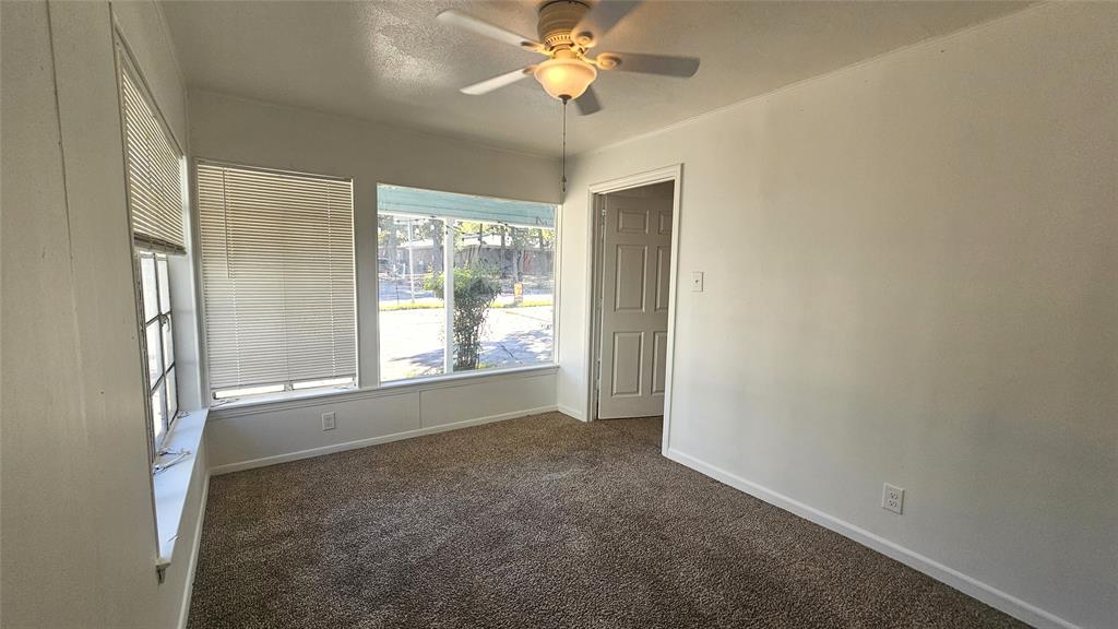 2621 North Locust Street Denton, TX 76209 - Photo 9 of 26 a view of an empty room with a window
