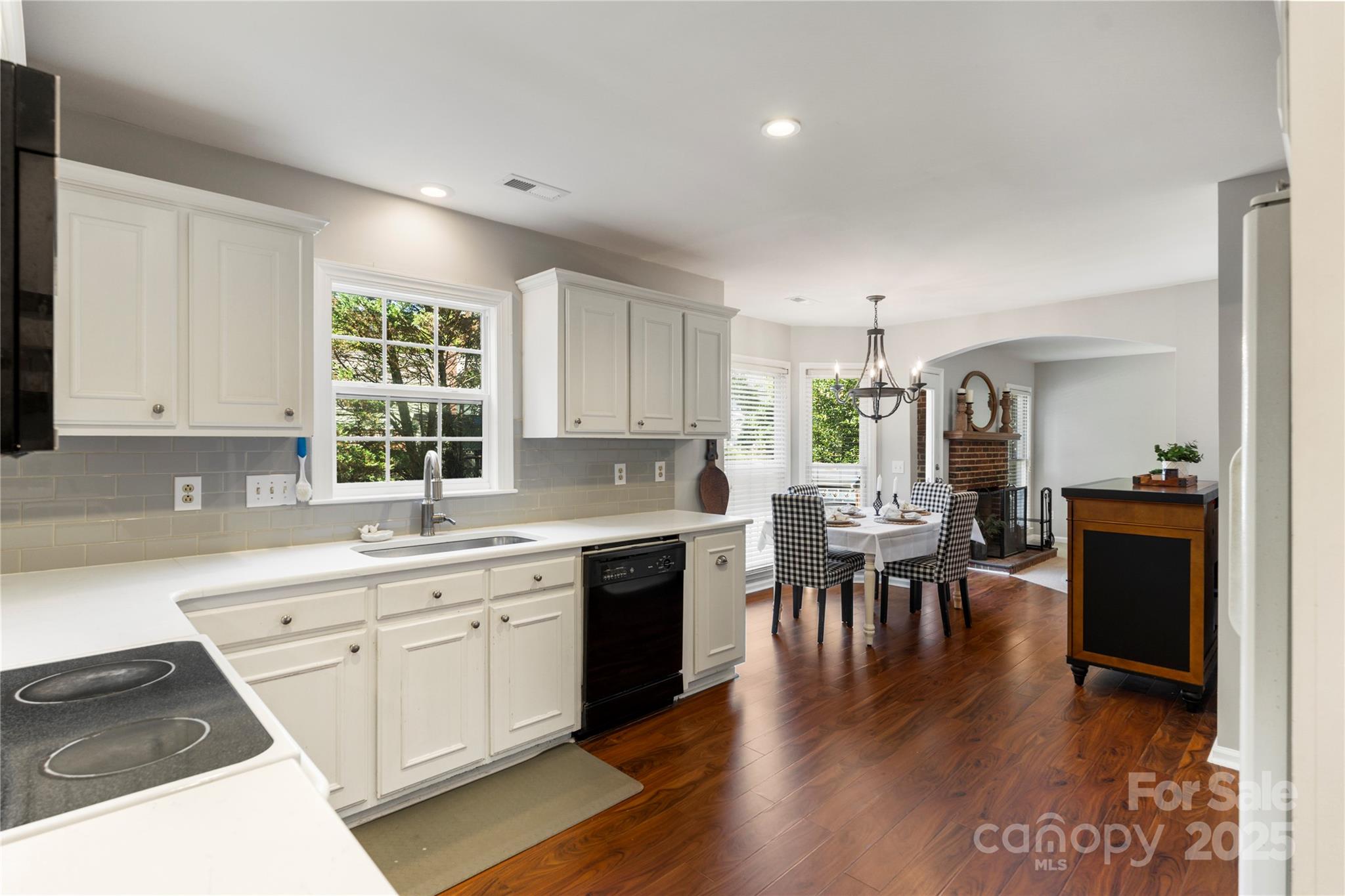 2519 Fitzpatrick Lane Matthews, NC 28105 - Photo 15 of 46 a kitchen with lots of counter top space and dining table