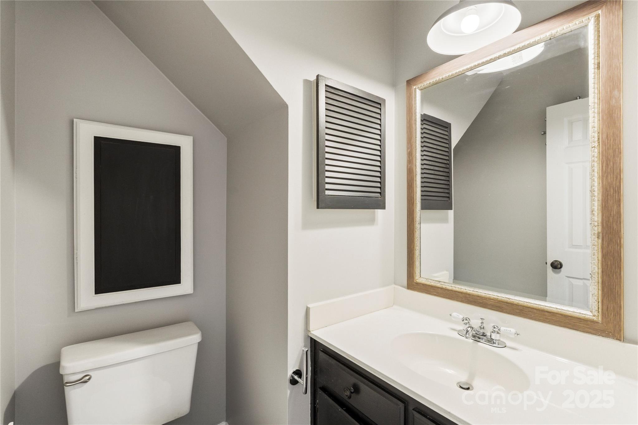 2519 Fitzpatrick Lane Matthews, NC 28105 - Photo 21 of 46 a bathroom with a sink and a toilet