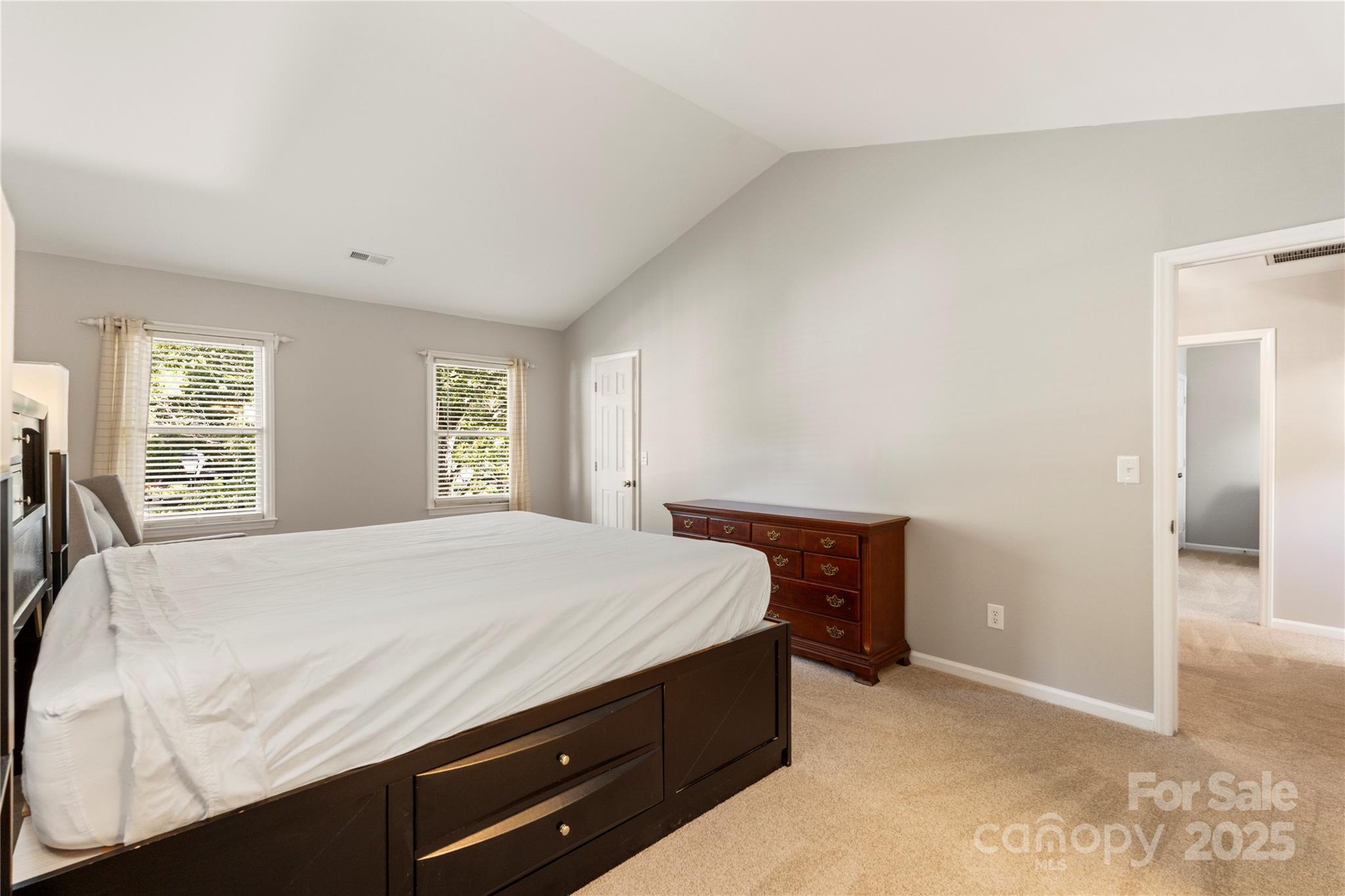 2519 Fitzpatrick Lane Matthews, NC 28105 - Photo 23 of 46 a bedroom with a bed and window
