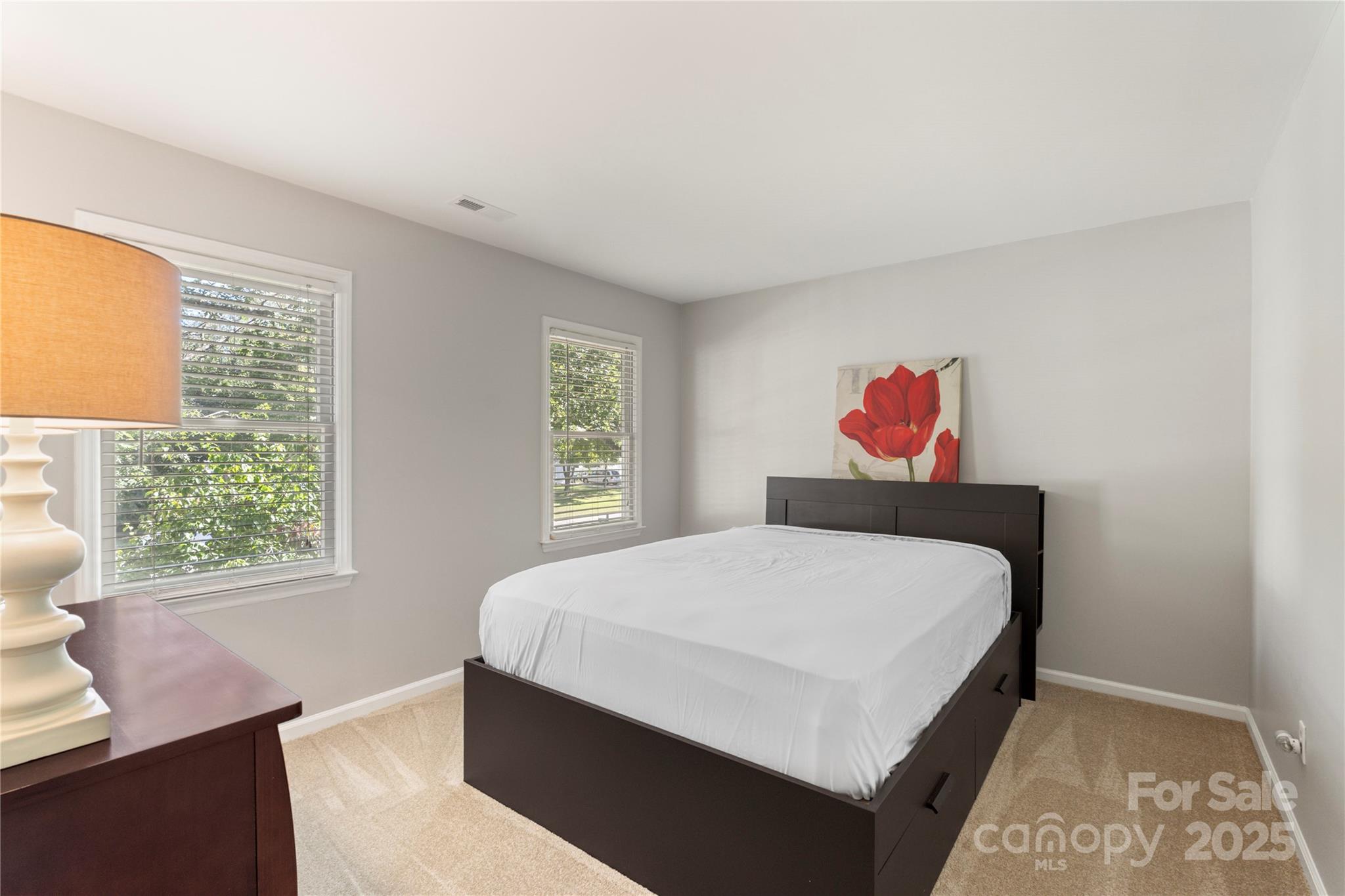 2519 Fitzpatrick Lane Matthews, NC 28105 - Photo 29 of 46 a bedroom with a bed and a window