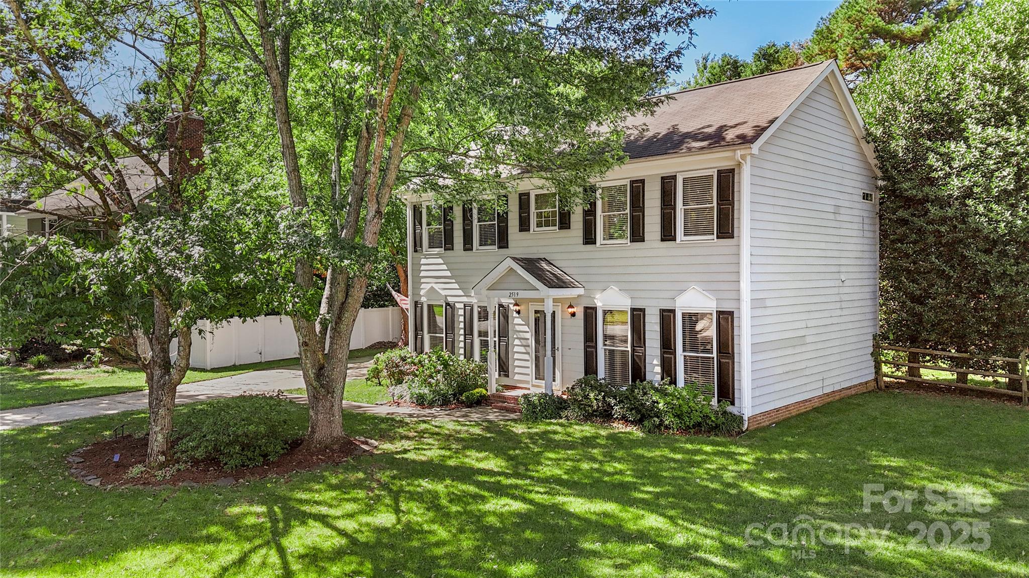 2519 Fitzpatrick Lane Matthews, NC 28105 - Photo 46 of 46 a front view of a house with a yard
