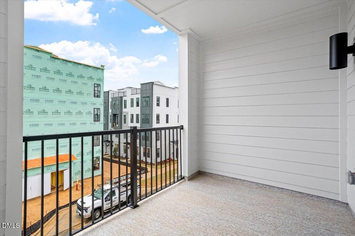 509 Kildaire Farm Road, Unit 302 Cary, NC 27511 - Photo 14 of 30 a view of a balcony with city