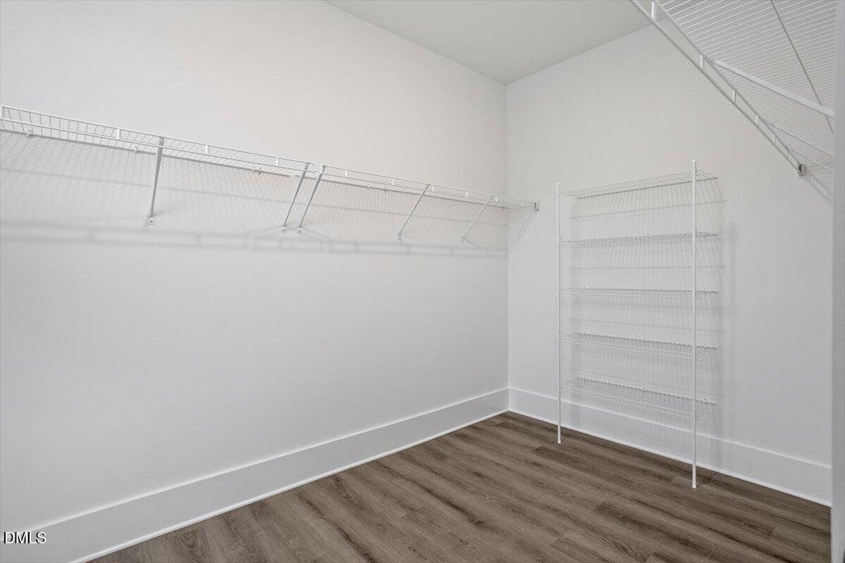 509 Kildaire Farm Road, Unit 302 Cary, NC 27511 - Photo 22 of 30 a view of a room with empty racks