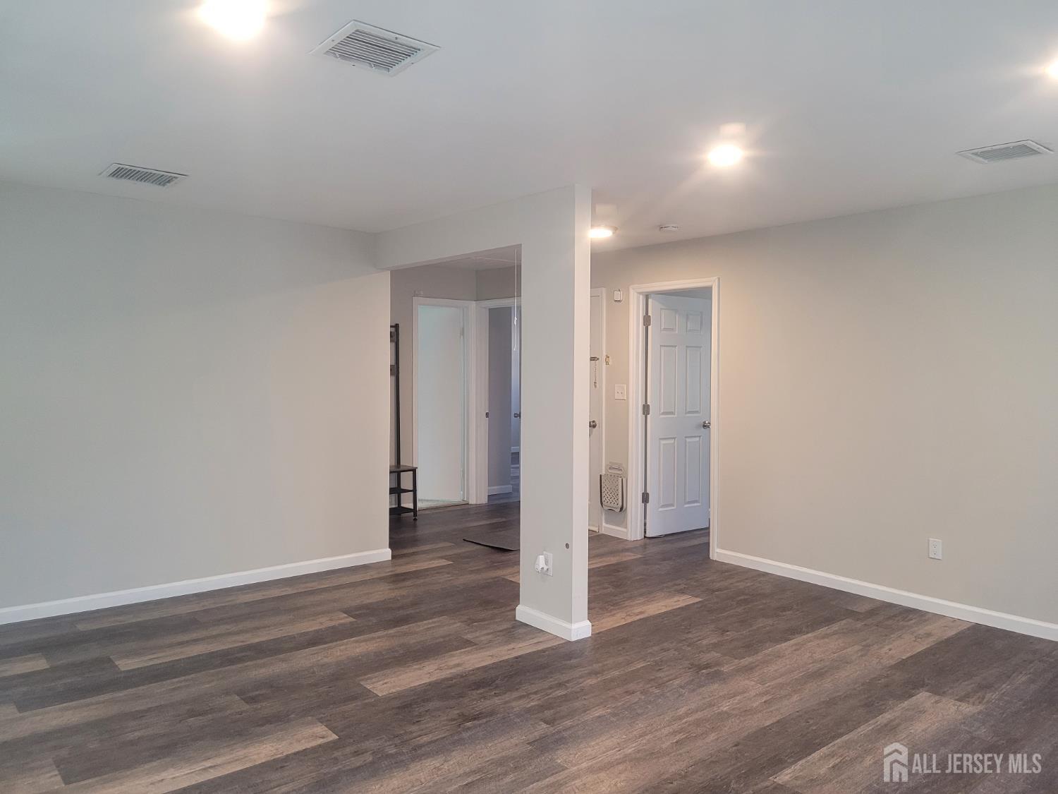 249 Olsen Street, Unit 2 Sayreville, NJ 08879 - Photo 5 of 24 a view of an empty room