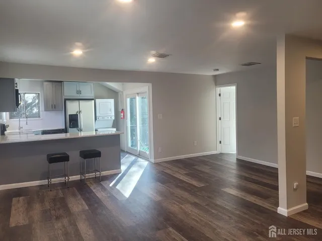 a view of kitchen and windows