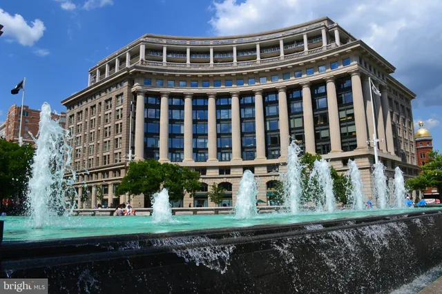 a front view of a building with garden