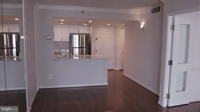 a view of kitchen with wooden floor
