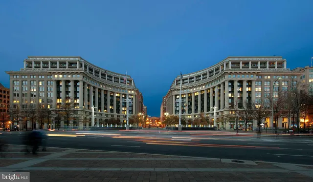 a view of a building with a street