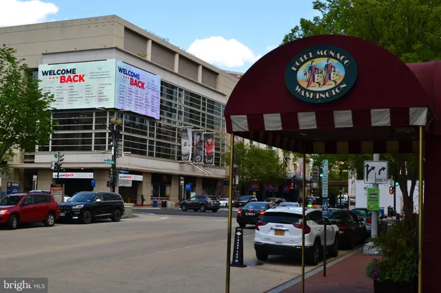 a view of a street with sitting area