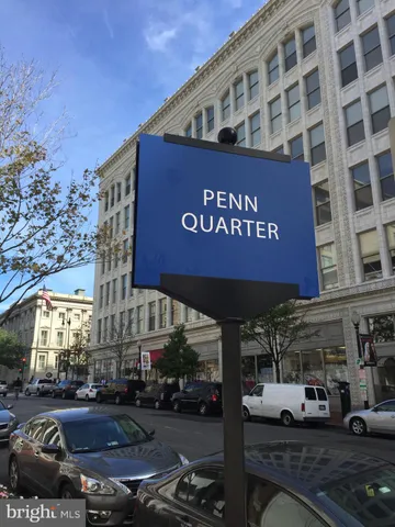 a view of a street with cars