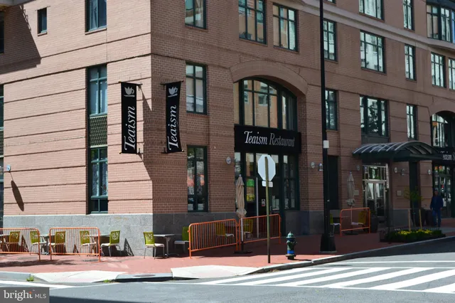 a front view of a building with street view