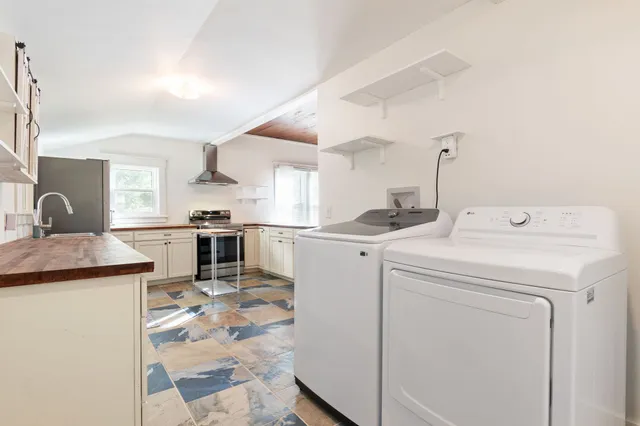a view of kitchen and sink