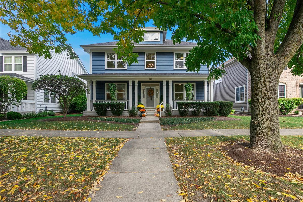 front view of a house with a yard