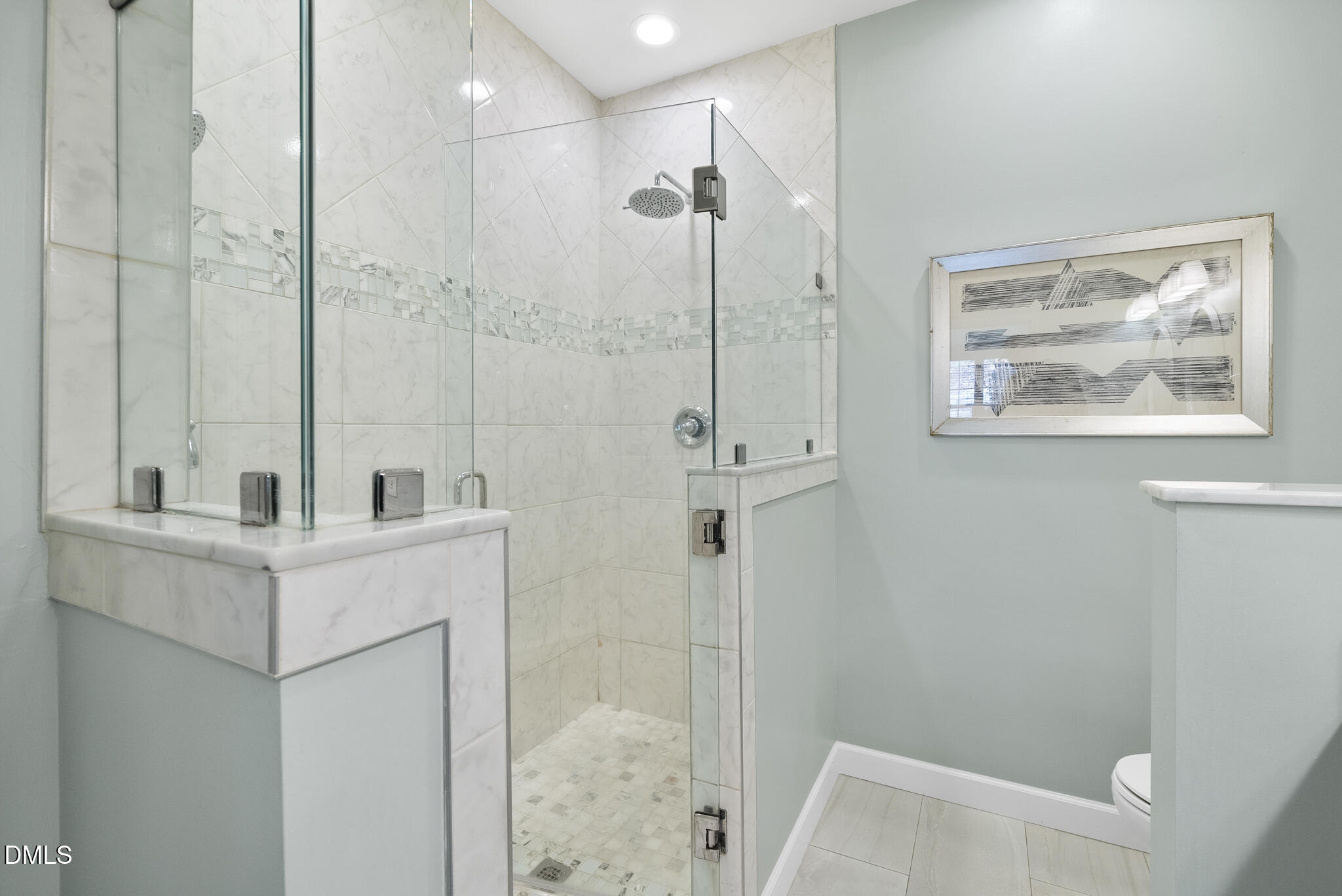 7710 Astoria Place Raleigh, NC 27612 - Photo 19 of 34 a view of bathroom with shower