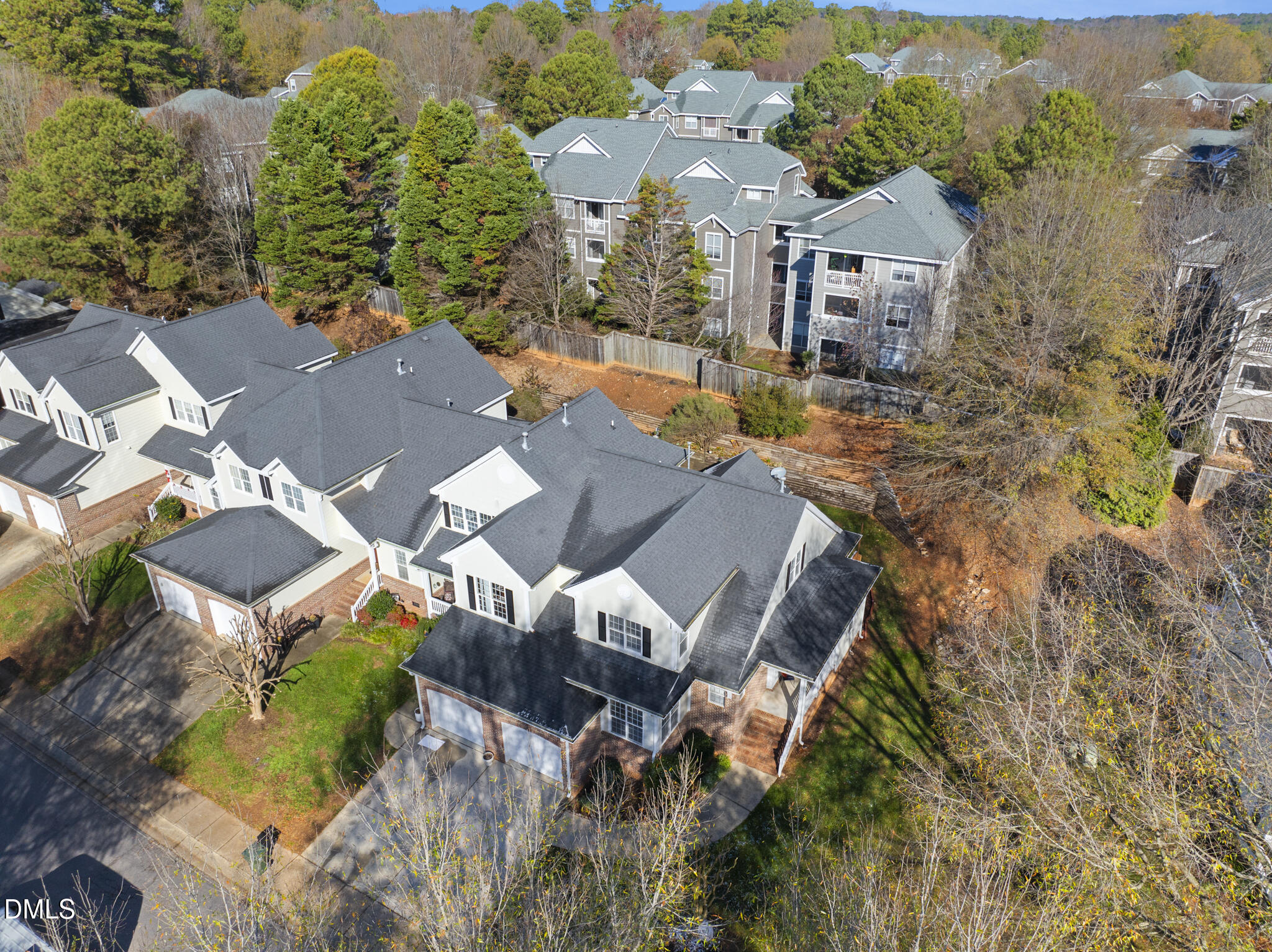 7710 Astoria Place Raleigh, NC 27612 - Photo 33 of 34 an aerial view of a house with a garden
