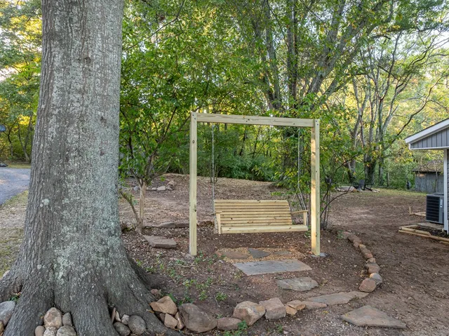a view of a room with a tree