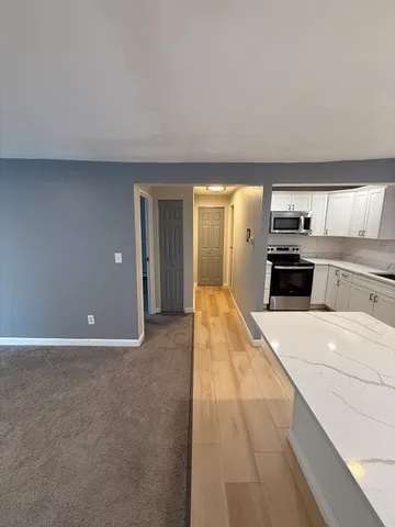 a view of a kitchen with a sink