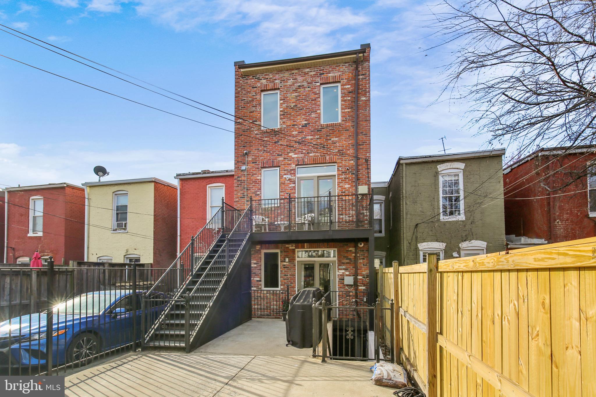 618 L Street Northeast, Unit 2 Washington, DC 20002 - Photo 4 of 73 Fully fenced & gated yard with 1 parking space