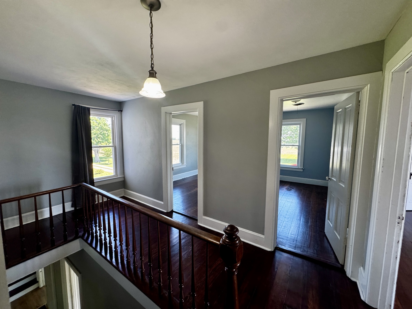 16606 West Backbone Road Princeton, IL 61356 - Photo 18 of 40 a view of a hallway with wooden floor and windows