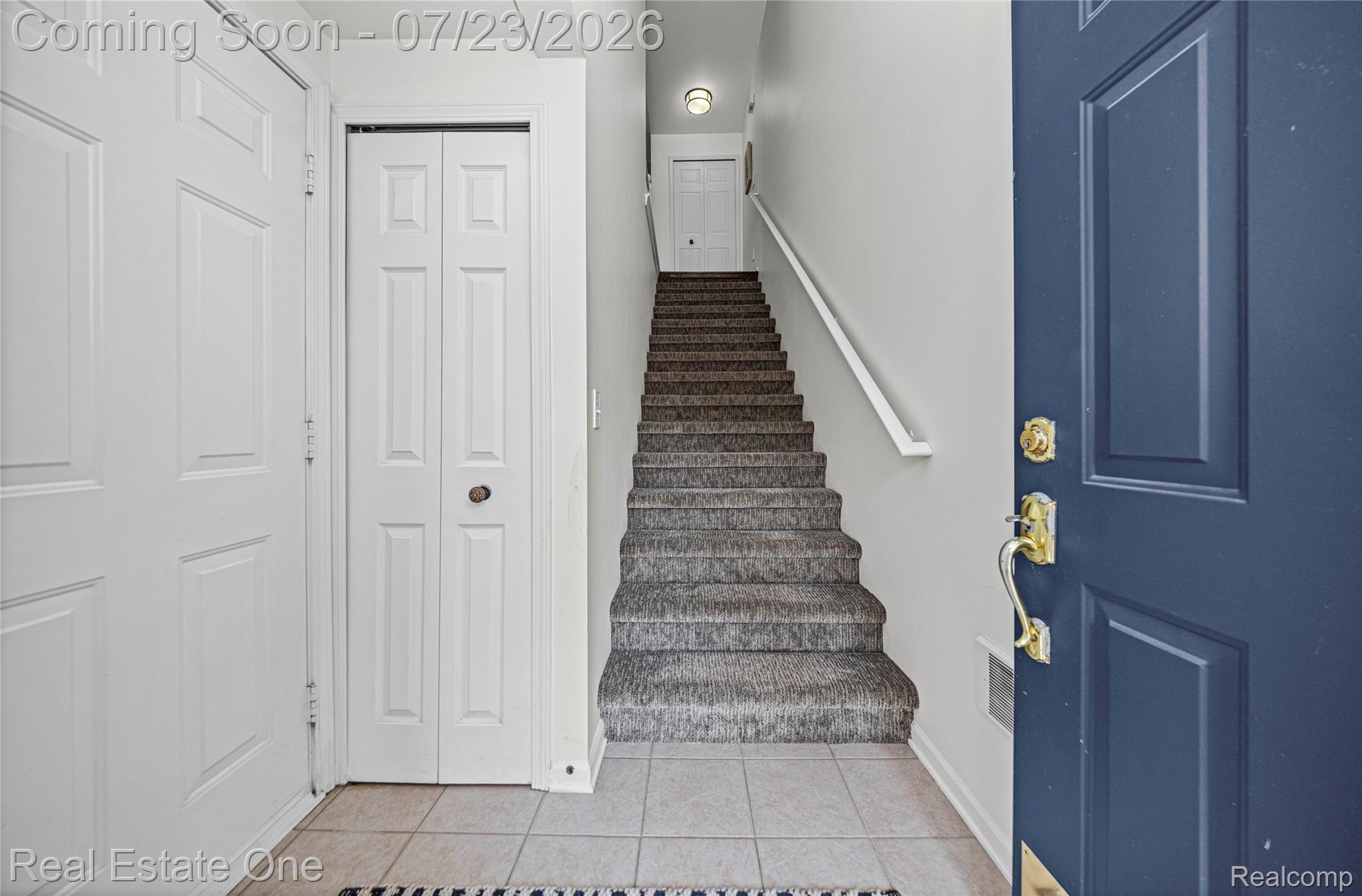 3570 Tremonte Circle, Unit 282 Rochester, MI 48306 - Photo 10 of 44 Come on in! Entry foyer w/ TWO coat closets (one not pictured). Garage access to the left. 2023 premium carpet.