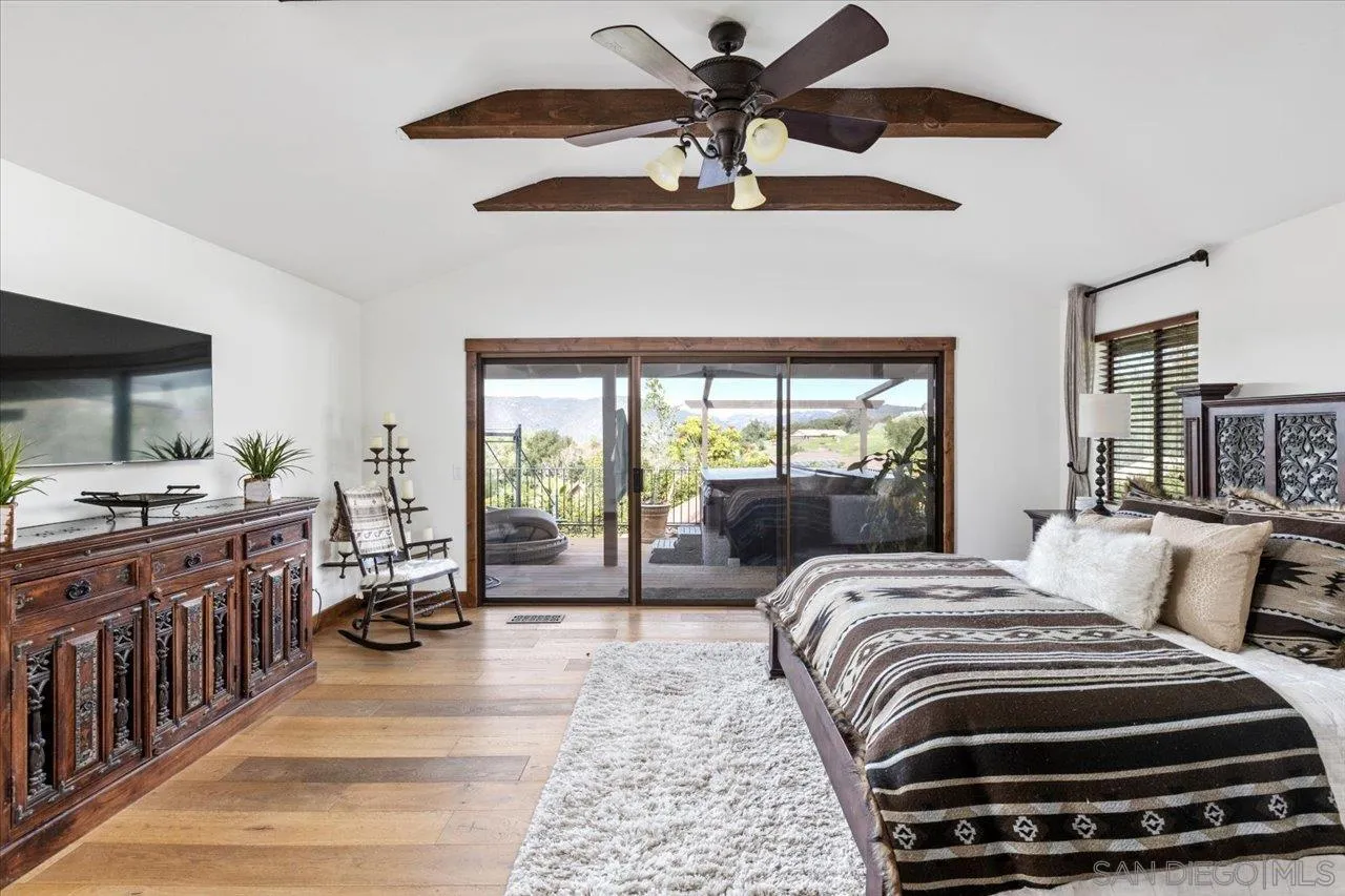 1379 Sunny Heights Road Fallbrook, CA 92028 - Photo 24 of 64 a bedroom with furniture and a large window