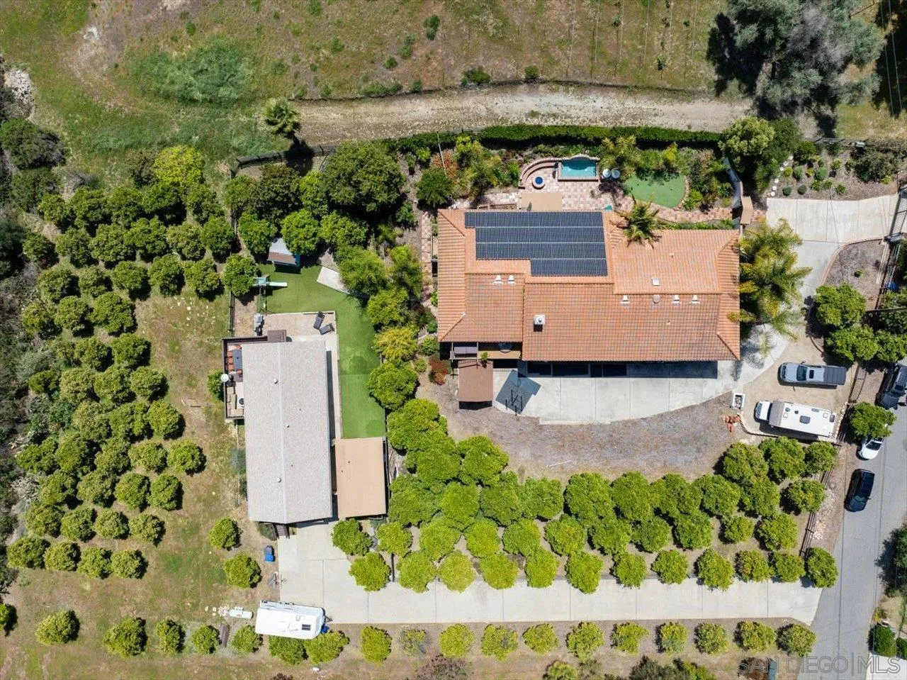 1379 Sunny Heights Road Fallbrook, CA 92028 - Photo 3 of 64 an aerial view of a house with a yard