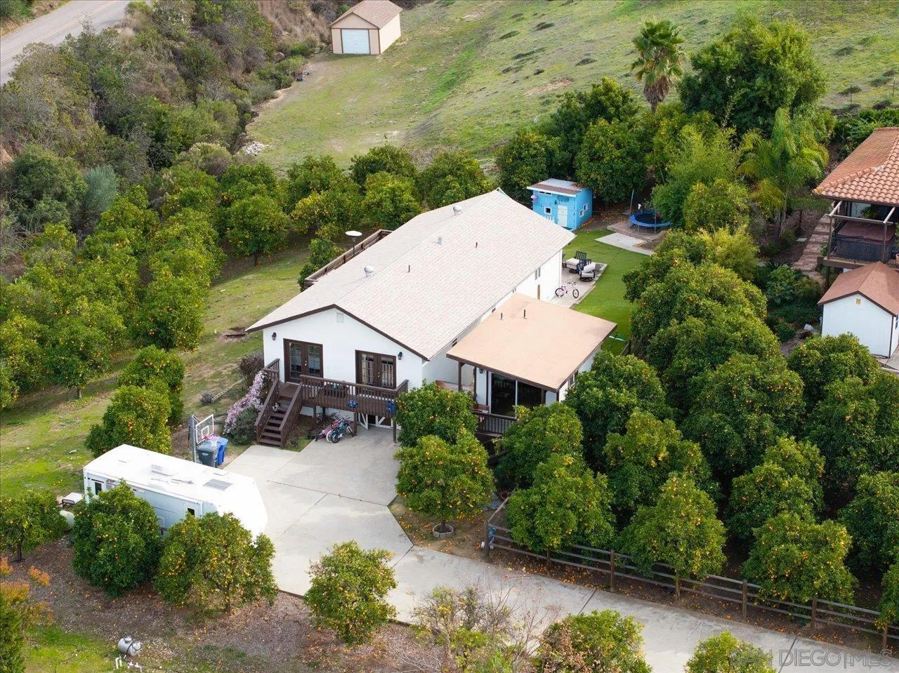 1379 Sunny Heights Road Fallbrook, CA 92028 - Photo 35 of 64 an aerial view of a house with yard and green space