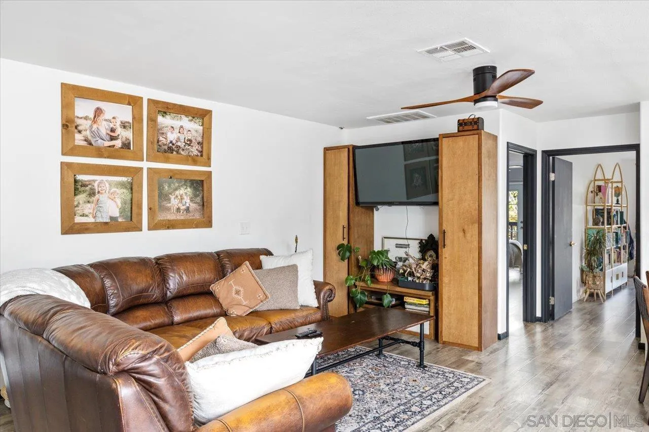 1379 Sunny Heights Road Fallbrook, CA 92028 - Photo 36 of 64 a living room with furniture and a window