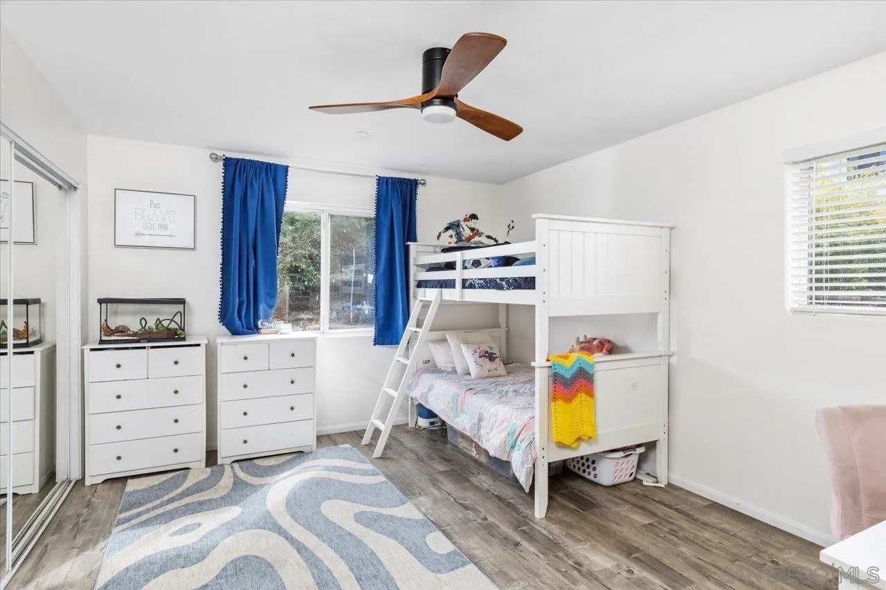 1379 Sunny Heights Road Fallbrook, CA 92028 - Photo 43 of 64 a bed room with a bed and a window