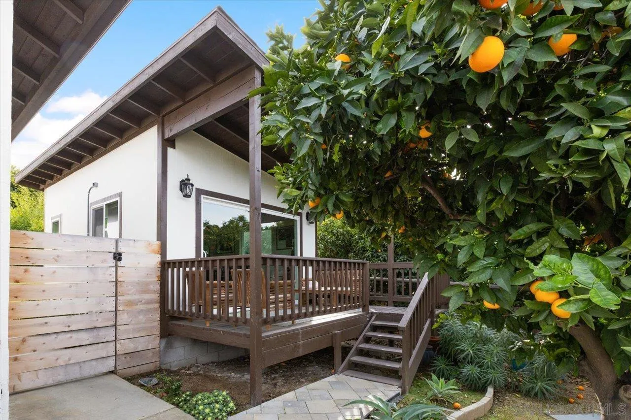 1379 Sunny Heights Road Fallbrook, CA 92028 - Photo 50 of 64 a view of a roof deck with wooden floor and fence
