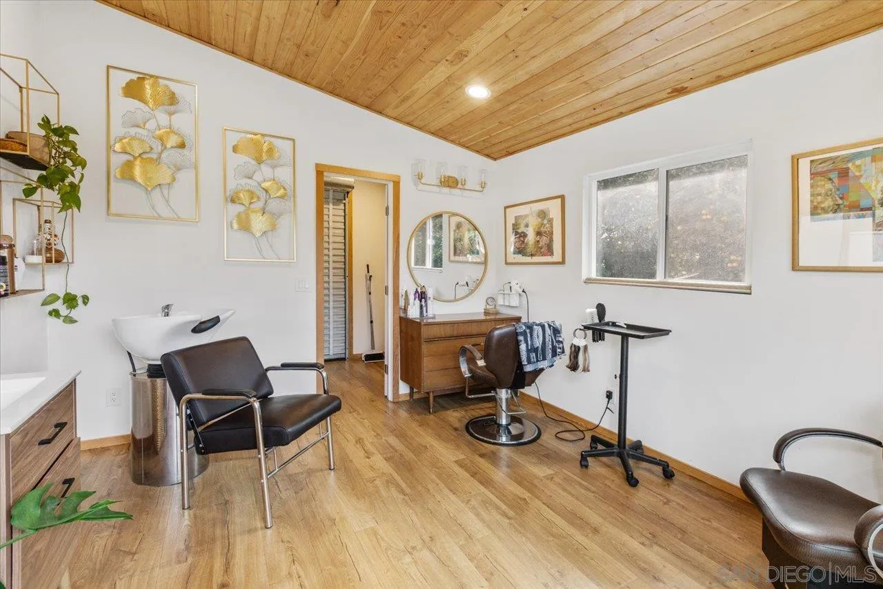 1379 Sunny Heights Road Fallbrook, CA 92028 - Photo 52 of 64 a view of a livingroom with furniture and a gym equipment
