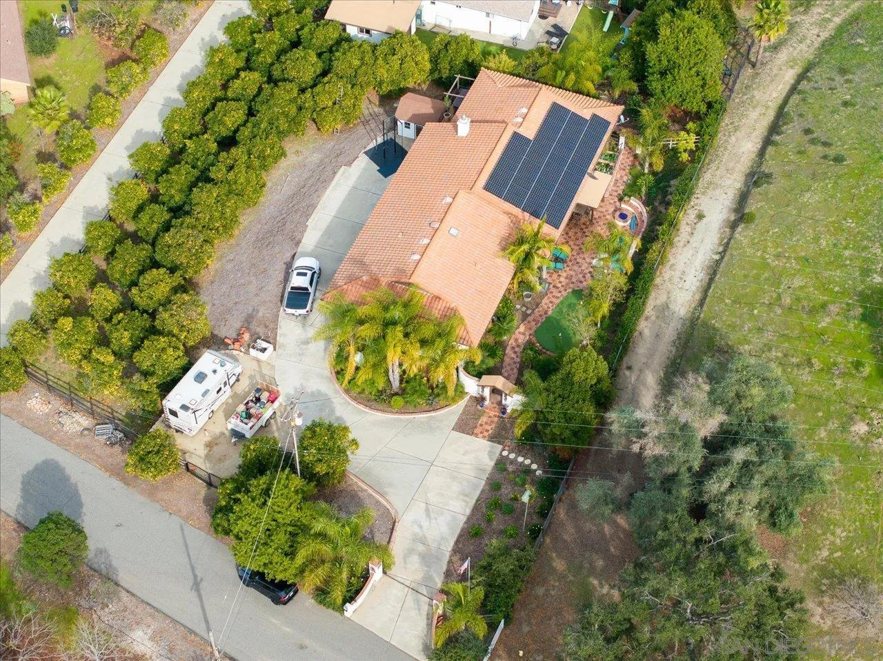 1379 Sunny Heights Road Fallbrook, CA 92028 - Photo 57 of 64 an aerial view of a house with a yard and garden