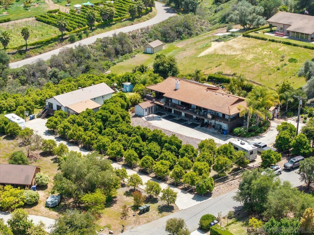 1379 Sunny Heights Road Fallbrook, CA 92028 - Photo 59 of 64 an aerial view of a house with a yard and lake view
