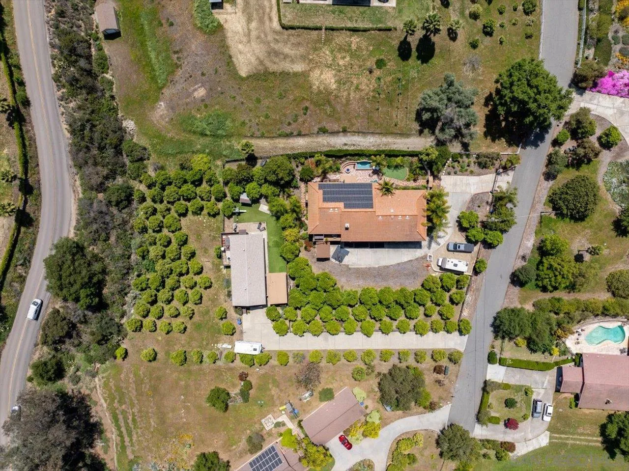 1379 Sunny Heights Road Fallbrook, CA 92028 - Photo 60 of 64 an aerial view of a house with a yard
