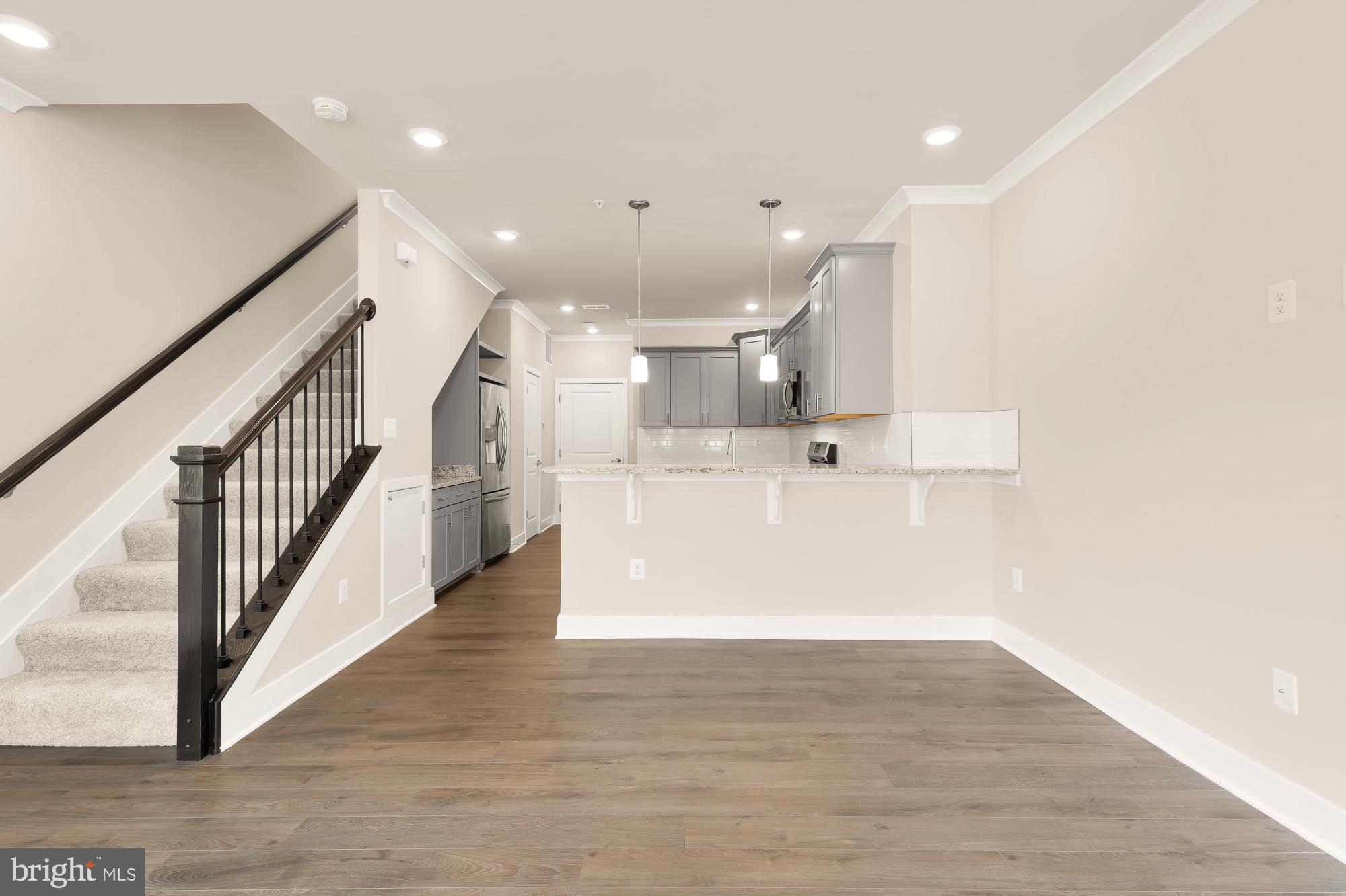 7964 Potter Place, Unit B Elkridge, MD 21075 - Photo 6 of 25 Living & Dining Room open to Kitchen
